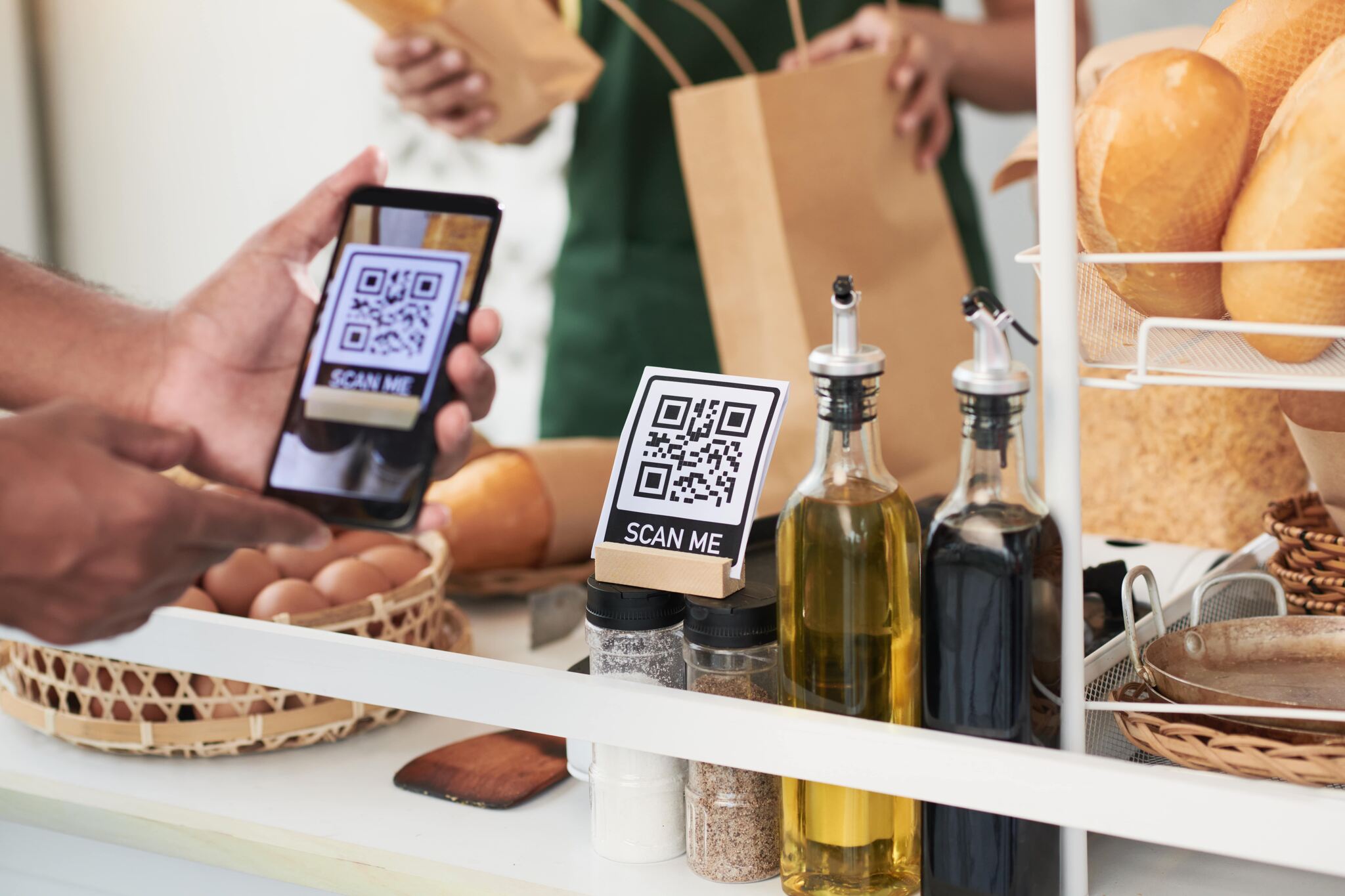 customer scanning a QR code with a clear call to action