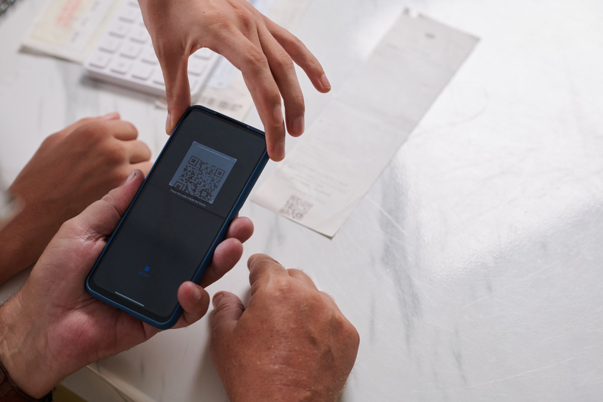 Scanning a QR code on a printed document for instant verification
