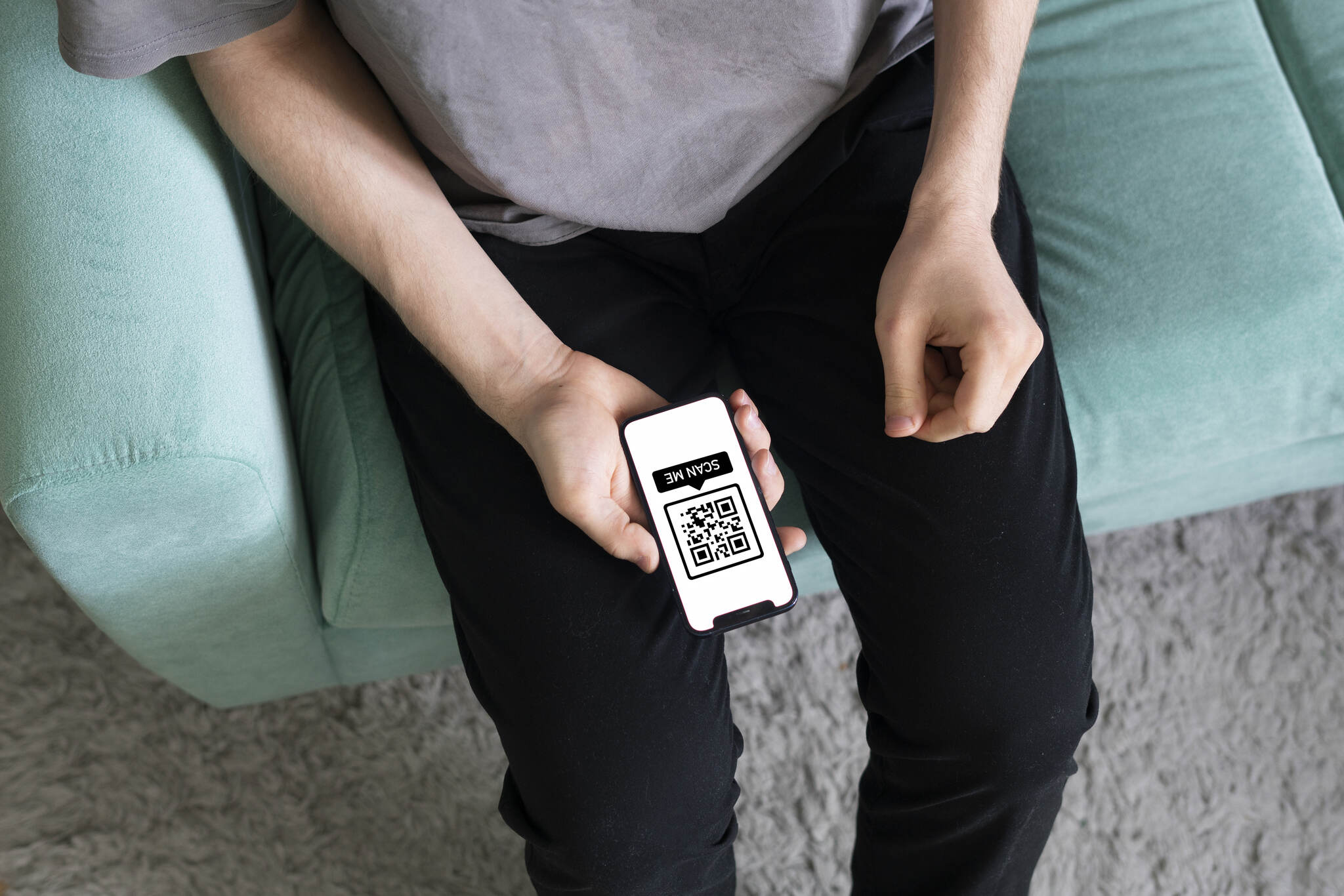 a person hand hold smartphone with scanned QR code