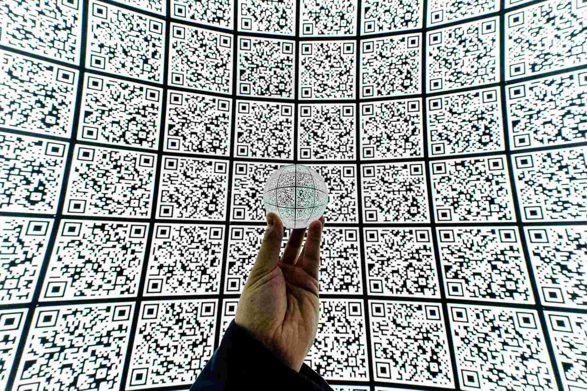 Bunch of QR codes on a big screen