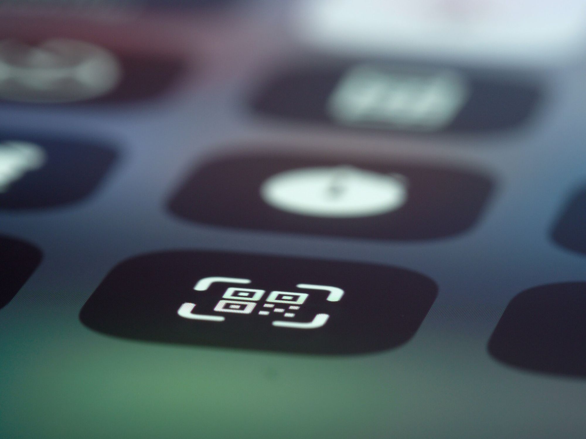 A QR code displayed on a smartphone screen, ready to be scanned by another device
