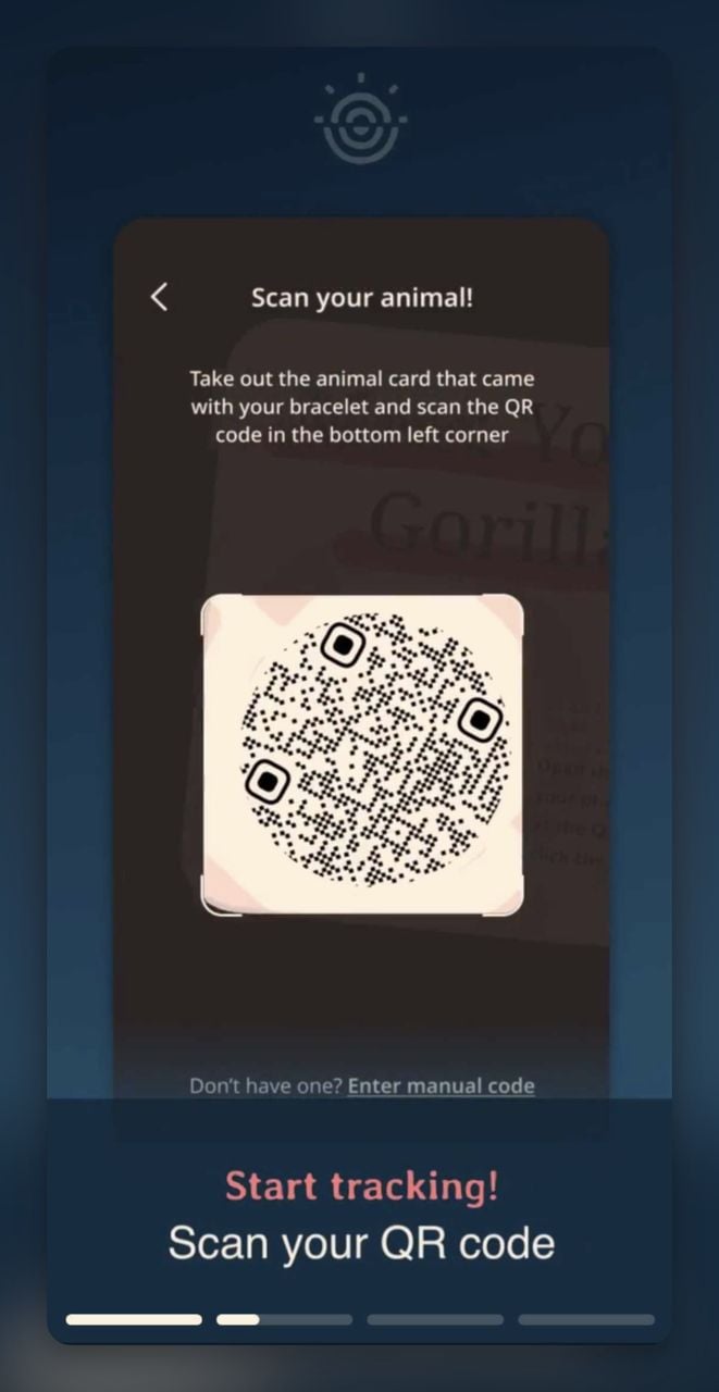 Screenshot of the Fahlo app prompt instructing users to scan the QR code from the animal card included with their bracelet.
