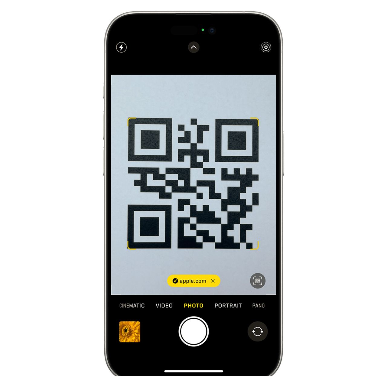iPhone showing a yellow QR code notification banner at the top of the camera screen