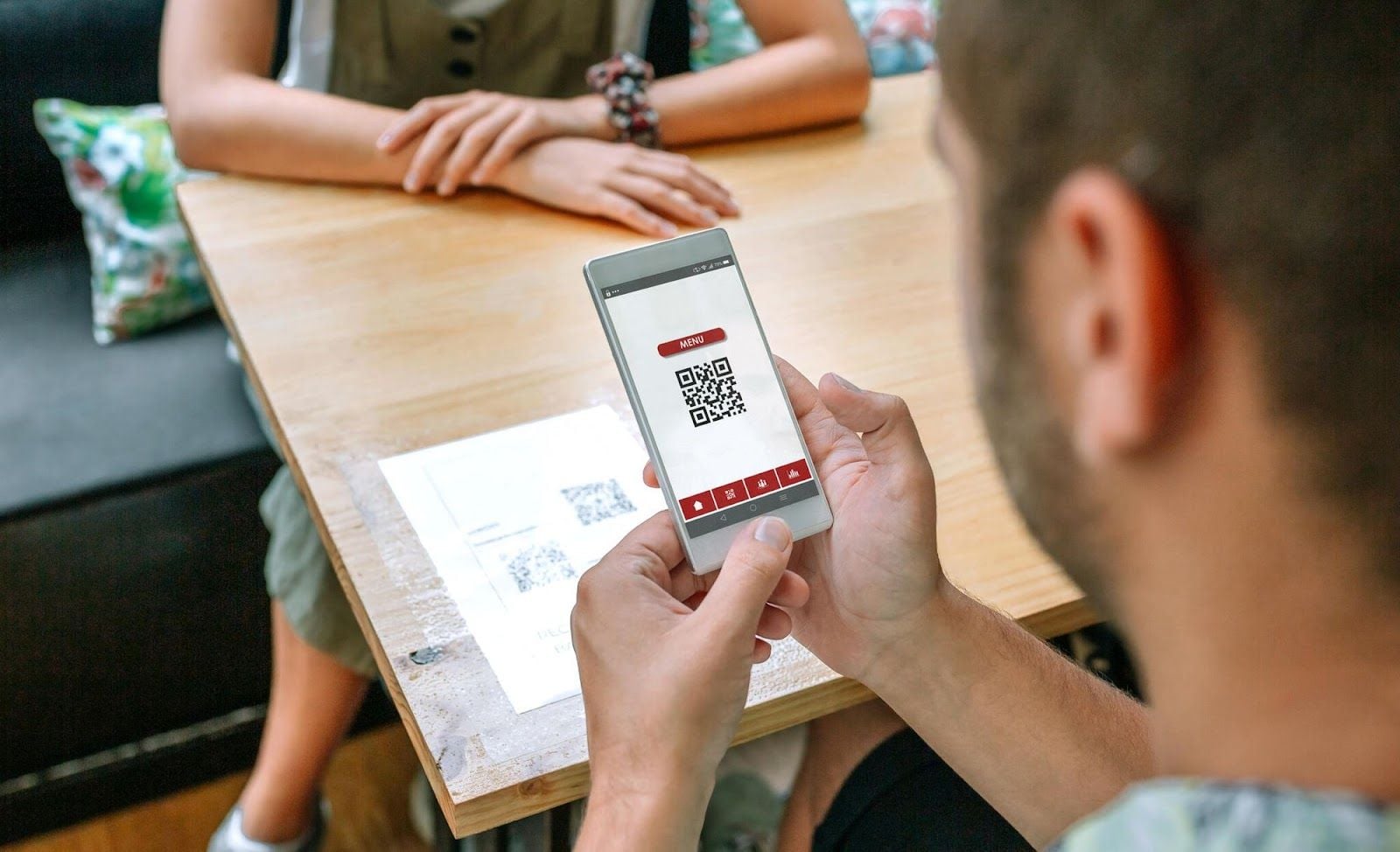 Third-party QR scanner apps showing scan history and result formatting on mobile
